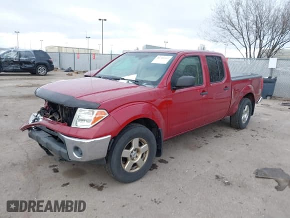 ✅ 2007 Nissan Frontier SE • VIN: 1N6AD09W47C451910 • Lot: 41789447. Listed on IAAI with 204,747 mi. Free auction sales archive from the USA and detailed vehicle history report at DreamBid. Image 2.