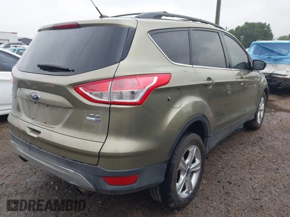 ✅ 2013 Ford Escape SE • VIN: 1FMCU9G9XDUD72871 • Lot: 42194776. Listed on IAAI with 70,031 mi. Free auction sales archive from the USA and detailed vehicle history report at DreamBid. Image 4.