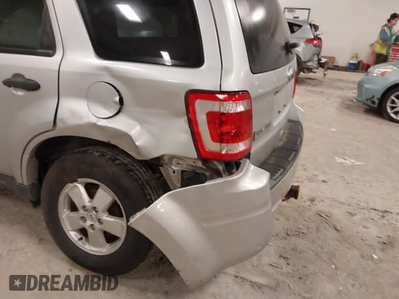 ✅ 2010 Ford Escape XLT • VIN: 1FMCU0D72AKD21628 • Lot: 43529971. Listed on IAAI with 191,450 mi. Free auction sales archive from the USA and detailed vehicle history report at DreamBid. Image 6.