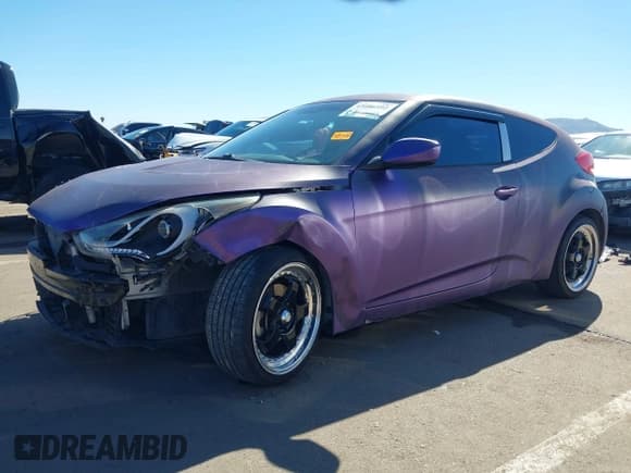 ✅ 2014 Hyundai Veloster • VIN: KMHTC6AD9EU192734 • Lot: 43486592. Wystawiony na IAAI z przebiegiem 142 610 mil. Bezpłatny archiwum sprzedaży aukcyjnych z USA i szczegółowy raport historii pojazdu na DreamBid. Zdjęcie 2.