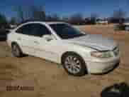 2006 Hyundai Azera SE z VIN KMHFC46F46A134061, wystawiony jako Copart lot #87227344 z przebiegiem 224 496 mil mil oraz Szkoda całkowita • Salvage title. Historia ofert i sprzedaży dostępna na DreamBid. Obrazek 4.