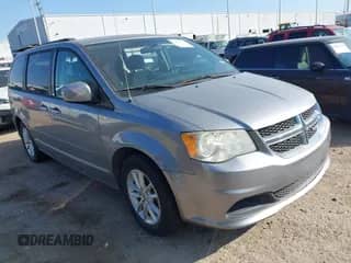 2014 Dodge Grand Caravan SXT z VIN 2C4RDGCG2ER155157, wystawiony jako IAAI lot #43513121 z przebiegiem 131 845 mil mil oraz . Historia ofert i sprzedaży dostępna na DreamBid. Obrazek 1.