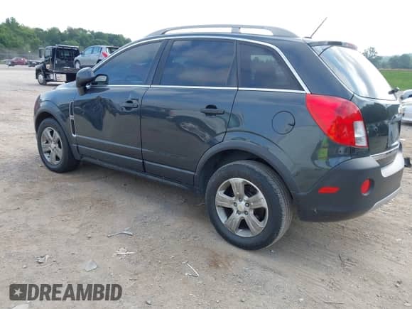 2015 Chevrolet Captiva Sport LS z VIN 3GNAL2EK8FS504113, wystawiony jako IAAI lot #43040886 z przebiegiem 176 003 mil mil oraz . Historia ofert i sprzedaży dostępna na DreamBid. Obrazek 3.