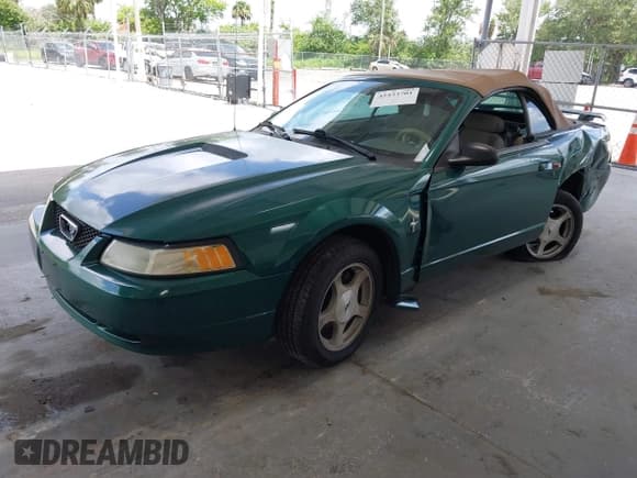 ✅ 2001 Ford Mustang Deluxe • VIN: 1FAFP44441F198354 • Lot: 42433701. Listed on IAAI with 69,328 mi. Free auction sales archive from the USA and detailed vehicle history report at DreamBid. Image 2.