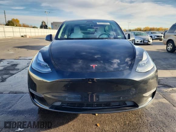 ✅ 2023 Tesla Model Y Performance • VIN: 7SAYGDEF0PF587513 • Lot: 87410865. Wystawiony na Copart z przebiegiem 47 429 mil. Bezpłatny archiwum sprzedaży aukcyjnych z USA i szczegółowy raport historii pojazdu na DreamBid. Zdjęcie 5.