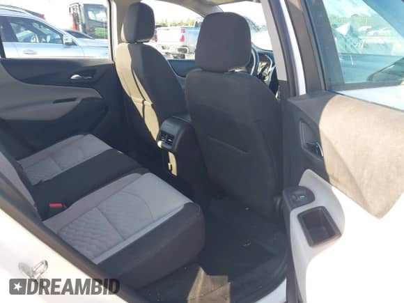 2018 Chevrolet Equinox LS with VIN 2GNAXHEV3J6215116, listed as a IAAI auction lot 43493833 with 74,000 mi miles and . Bid and sale history available at DreamBid. Image 8.