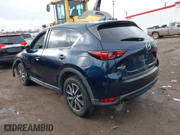 ✅ 2018 Mazda CX-5 Grand Touring • VIN: JM3KFBDM5J0426677 • Lot: 43579829. Listed on IAAI with 94,077 mi. Free auction sales archive from the USA and detailed vehicle history report at DreamBid. Image 3.