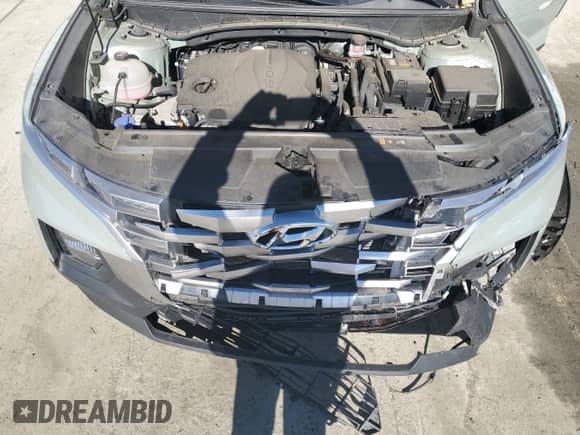 2022 Hyundai Santa Cruz SEL z VIN 5NTJBDAE6NH020359, wystawiony jako Copart lot #75840064 z przebiegiem 14 544 mil mil oraz Szkoda całkowita • Salvage title. Historia ofert i sprzedaży dostępna na DreamBid. Obrazek 11.