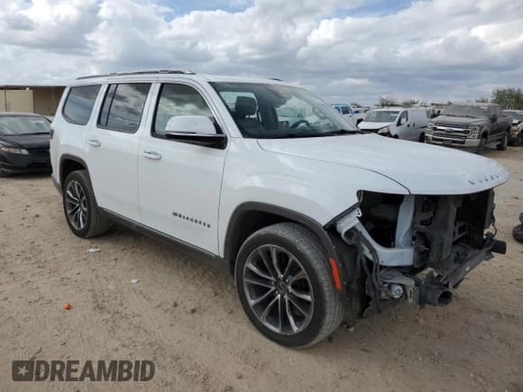 ✅ 2022 Jeep Wagoneer Series III • VIN: 1C4SJVDTXNS102487 • Lot: 82787205. Listed on Copart with 99,353 mi. Free auction sales archive from the USA and detailed vehicle history report at DreamBid. Image 4.