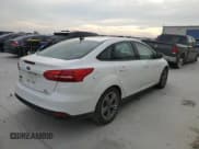 ✅ 2018 Ford Focus SE • VIN: 1FADP3FE7JL229119 • Lot: 87000115. Listed on Copart with 138,033 mi. Free auction sales archive from the USA and detailed vehicle history report at DreamBid. Image 3.