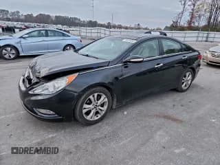 ✅ 2013 Hyundai Sonata Limited • VIN: 5NPEC4AC1DH581675 • Lot: 93033695. Listed on Copart with 133,052 mi. Free auction sales archive from the USA and detailed vehicle history report at DreamBid. Image 1.