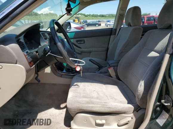 ✅ 2002 Subaru Legacy Outback • VIN: 4S3BH665326645636 • Lot: 61762555. Listed on Copart with 142,350 mi. Free auction sales archive from the USA and detailed vehicle history report at DreamBid. Image 7.