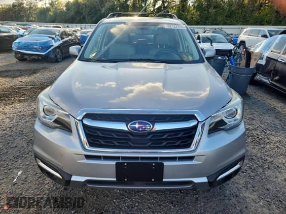 2017 Subaru Forester Limited with VIN JF2SJARC4HH510116, listed as a Copart auction lot 82122265 with 87,527 mi miles and Salvage title. Bid and sale history available at DreamBid. Image 5.