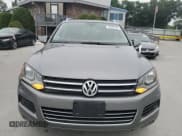 ✅ 2013 Volkswagen Touareg Lux • VIN: WVGEF9BP9DD002651 • Lot: 63206245. Listed on Copart with 186,860 mi. Free auction sales archive from the USA and detailed vehicle history report at DreamBid. Image 5.