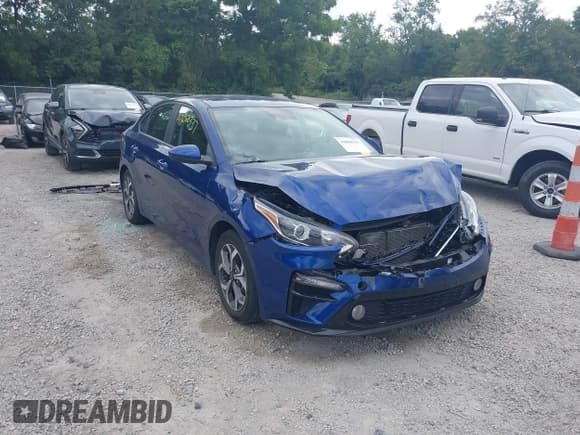 ✅ 2021 Kia Forte LXS • VIN: 3KPF24AD3ME412827 • Lot: 43068337. Listed on IAAI with 31,775 mi. Free auction sales archive from the USA and detailed vehicle history report at DreamBid. Image 1.