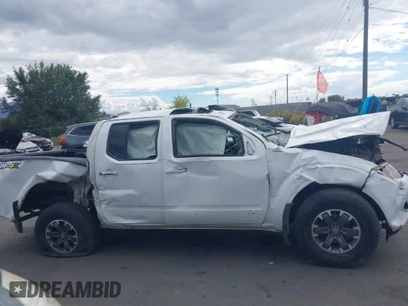 ✅ 2016 Nissan Frontier SV • VIN: 1N6AD0EV8GN786542 • Lot: 43321072. Listed on IAAI with 108,088 mi. Free auction sales archive from the USA and detailed vehicle history report at DreamBid. Image 14.