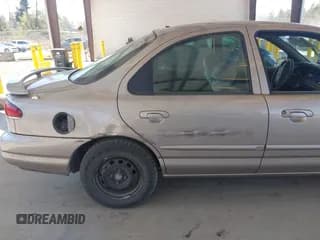 ✅ 1996 Mercury Mystique • VIN: 1MELM6535TK600110 • Лот: 42807327. Опубликован ранее на IAAI с пробегом 127 009 миль. Бесплатный доступ к архиву аукционных продаж из США и подробный отчёт об истории автомобиля на DreamBid. Изображение 6.