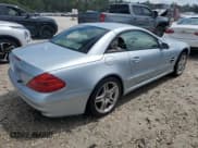 ✅ 2006 Mercedes-Benz SL 500 • VIN: WDBSK75F86F116057 • Лот: 63797074. Опубликован ранее на Copart с пробегом 56 973 миль. Бесплатный доступ к архиву аукционных продаж из США и подробный отчёт об истории автомобиля на DreamBid. Изображение 3.