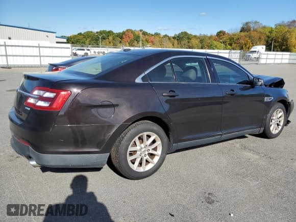 ✅ 2014 Ford Taurus SE • VIN: 1FAHP2D98EG129918 • Лот: 82547695. Опубликован ранее на Copart с пробегом 254 732 миль. Бесплатный доступ к архиву аукционных продаж из США и подробный отчёт об истории автомобиля на DreamBid. Изображение 3.