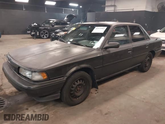 ✅ 1990 Toyota Camry • VIN: 4T1VV22E7LU030830 • Lot: 41971964. Wystawiony na IAAI z przebiegiem 164 488 mil. Bezpłatny archiwum sprzedaży aukcyjnych z USA i szczegółowy raport historii pojazdu na DreamBid. Zdjęcie 2.