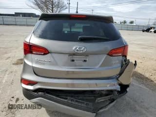 ✅ 2018 Hyundai Santa Fe 2.4L • VIN: 5NMZT3LB5JH088722 • Лот: 45246953. Опубликован ранее на Copart с пробегом 55 389 миль. Бесплатный доступ к архиву аукционных продаж из США и подробный отчёт об истории автомобиля на DreamBid. Изображение 6.