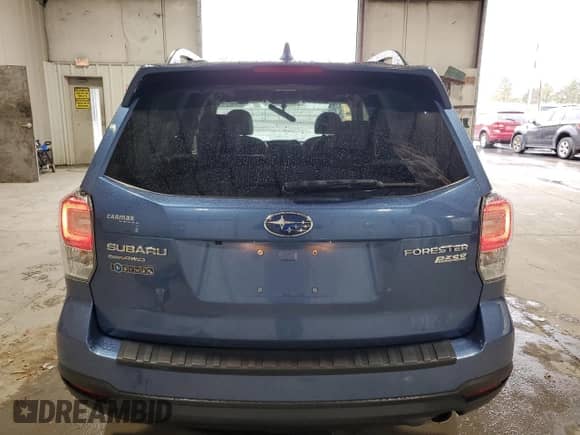 2017 Subaru Forester Limited with VIN JF2SJAJC5HH527843, listed as a Copart auction lot 82440135 with 64,197 mi miles and Salvage title. Bid and sale history available at DreamBid. Image 6.