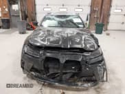 ✅ 2024 BMW M4 Competition xDrive • VIN: WBS43AZ07RCN35199 • Lot: 43642485. Listed on IAAI with 4,811 mi. Free auction sales archive from the USA and detailed vehicle history report at DreamBid. Image 13.