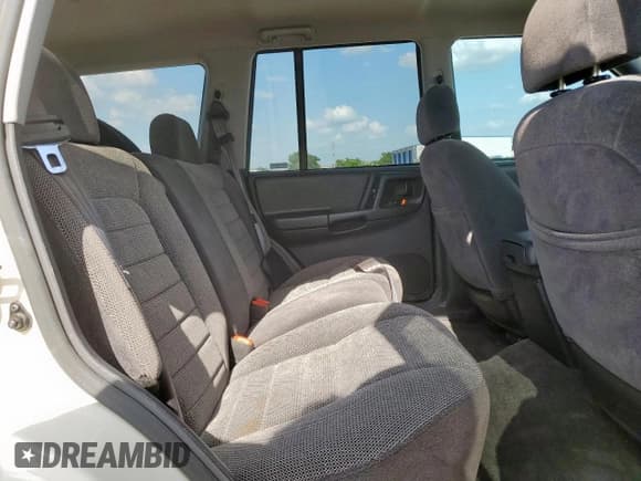 ✅ 1996 Jeep Grand Cherokee Laredo • VIN: 1J4FX58S6TC194152 • Lot: 62114165. Wystawiony na Copart z przebiegiem 50 956 mil. Bezpłatny archiwum sprzedaży aukcyjnych z USA i szczegółowy raport historii pojazdu na DreamBid. Zdjęcie 10.