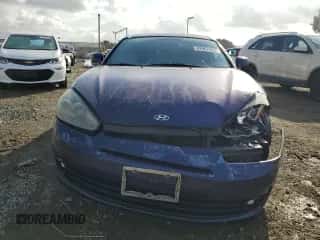 2007 Hyundai Tiburon GS z VIN KMHHM66D37U249105, wystawiony jako Copart lot #42967305 z przebiegiem 137 844 mil mil oraz Szkoda całkowita • Salvage title. Historia ofert i sprzedaży dostępna na DreamBid. Obrazek 5.