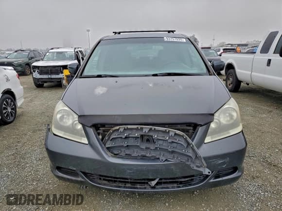 ✅ 2005 Honda Odyssey EX • VIN: 5FNRL38495B018738 • Lot: 93757035. Listed on Copart with 306,773 mi. Free auction sales archive from the USA and detailed vehicle history report at DreamBid. Image 5.