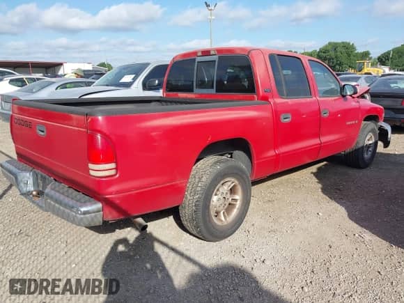 ✅ 2000 Dodge Dakota Sport • VIN: 1B7GL2AN0YS705134 • Лот: 41997957. Размещён на IAAI с пробегом 219 659 миль миль. Получите бесплатный доступ к архиву аукционных продаж из США и посмотрите подробный отчёт об истории автомобиля на DreamBid. Изображение 4.