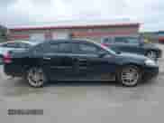 2012 Chevrolet Impala LTZ with VIN 2G1WC5E33C1155824, listed as a IAAI auction lot 43149723 with 148,084 mi miles and . Bid and sale history available at DreamBid. Image 13.