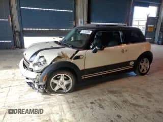 2007 MINI Hardtop with VIN WMWMF33537TT50320, listed as a Copart auction lot 71712285 with 51,321 mi miles and Salvage title. Bid and sale history available at DreamBid. Image 1.
