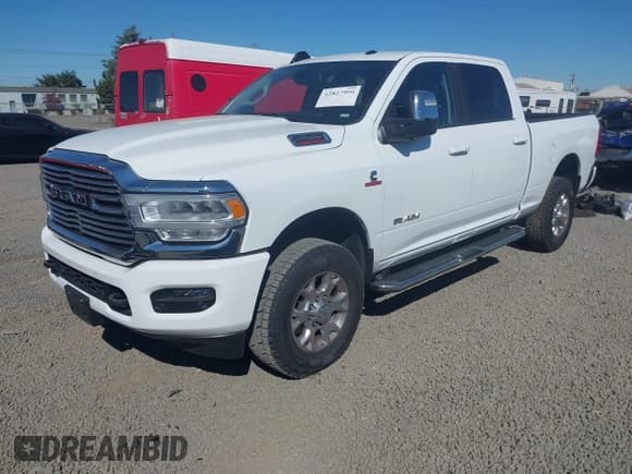 ✅ 2024 Ram 2500 Laramie • VIN: 3C6UR5FL7RG282210 • Lot: 42827990. Listed on IAAI with 18,704 mi. Free auction sales archive from the USA and detailed vehicle history report at DreamBid. Image 2.