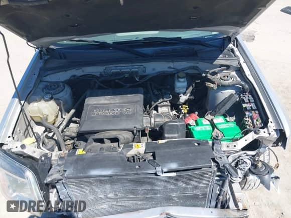 2010 Mercury Mariner Premier z VIN 4M2CN9HGXAKJ16116, wystawiony jako IAAI lot #43140056 z przebiegiem 194 370 mil mil oraz . Historia ofert i sprzedaży dostępna na DreamBid. Obrazek 10.