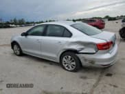 ✅ 2015 Volkswagen Jetta SE • VIN: 3VWD17AJ1FM311745 • Lot: 55936435. Listed on Copart with 79,819 mi. Free auction sales archive from the USA and detailed vehicle history report at DreamBid. Image 2.