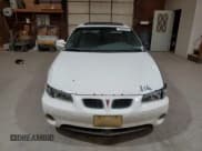 ✅ 2002 Pontiac Grand Prix GT • VIN: 1G2WP12K52F262028 • Лот: 70868895. Опубликован ранее на Copart с пробегом 323 648 миль. Бесплатный доступ к архиву аукционных продаж из США и подробный отчёт об истории автомобиля на DreamBid. Изображение 5.