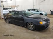 ✅ 2003 Pontiac Grand Am GT • VIN: 1G2NW52EX3M579719 • Лот: 49891365. Опубликован ранее на Copart с пробегом 153 838 миль. Бесплатный доступ к архиву аукционных продаж из США и подробный отчёт об истории автомобиля на DreamBid. Изображение 4.