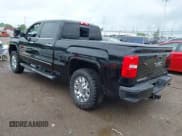 ✅ 2017 GMC Sierra 2500HD Denali • VIN: 1GT12UEY8HF213419 • Лот: 42720346. Опубликован ранее на IAAI с пробегом 169 799 миль. Бесплатный доступ к архиву аукционных продаж из США и подробный отчёт об истории автомобиля на DreamBid. Изображение 3.