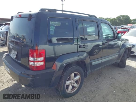 ✅ 2009 Jeep Liberty Sport • VIN: 1J8GP28K79W552805 • Лот: 42766622. Опубликован ранее на IAAI с пробегом 144 795 миль. Бесплатный доступ к архиву аукционных продаж из США и подробный отчёт об истории автомобиля на DreamBid. Изображение 4.