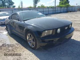 ✅ 2008 Ford Mustang GT Deluxe • VIN: 1ZVHT82H185174702 • Lot: 42978543. Listed on IAAI with 134,685 mi. Free auction sales archive from the USA and detailed vehicle history report at DreamBid. Image 1.