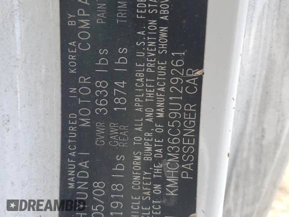 2009 Hyundai Accent Auto GS z VIN KMHCM36C59U129261, wystawiony jako Copart lot #62354155 z przebiegiem 122 261 mil mil oraz Szkoda całkowita • Salvage title. Historia ofert i sprzedaży dostępna na DreamBid. Obrazek 13.