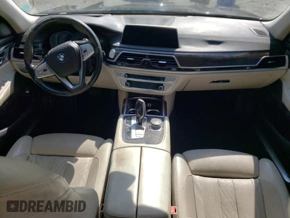 ✅ 2016 BMW 7 Series 740i • VIN: WBA7E2C56GG504506 • Лот: 81659585. Опубликован ранее на Copart с пробегом 93 842 миль. Бесплатный доступ к архиву аукционных продаж из США и подробный отчёт об истории автомобиля на DreamBid. Изображение 8.