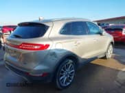 ✅ 2015 Lincoln MKC • VIN: 5LMCJ1A94FUJ20388 • Lot: 43799259. Listed on IAAI with 202,499 mi. Free auction sales archive from the USA and detailed vehicle history report at DreamBid. Image 4.