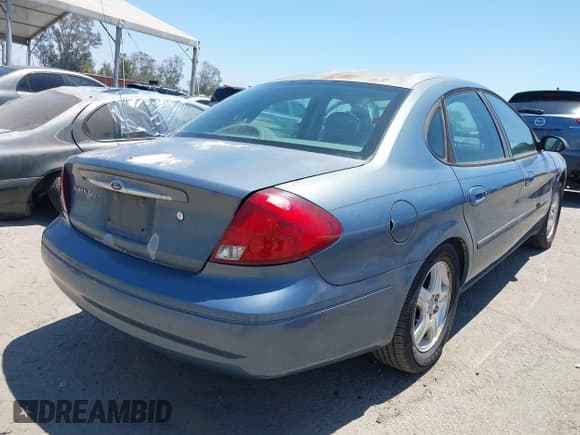 ✅ 2001 Ford Taurus SEL • VIN: 1FAHP56S41A119305 • Lot: 42842097. Listed on IAAI with 172,045 mi. Free auction sales archive from the USA and detailed vehicle history report at DreamBid. Image 4.