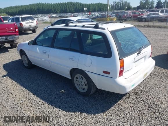 ✅ 1997 Ford Escort LX • VIN: 3FALP15P2VR102675 • Lot: 42447246. Listed on IAAI with 153,642 mi. Free auction sales archive from the USA and detailed vehicle history report at DreamBid. Image 3.