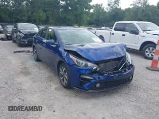 ✅ 2021 Kia Forte LXS • VIN: 3KPF24AD3ME412827 • Lot: 43068337. Listed on IAAI with 31,775 mi. Free auction sales archive from the USA and detailed vehicle history report at DreamBid. Image 1.