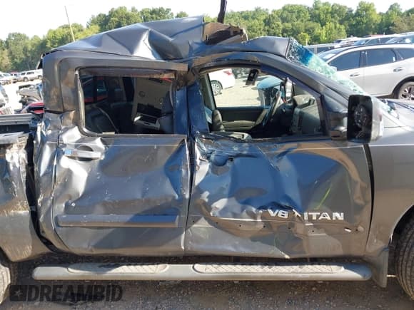 ✅ 2005 Nissan Titan LE • VIN: 1N6AA07BX5N558163 • Lot: 42771090. Listed on IAAI with 155,280 mi. Free auction sales archive from the USA and detailed vehicle history report at DreamBid. Image 12.