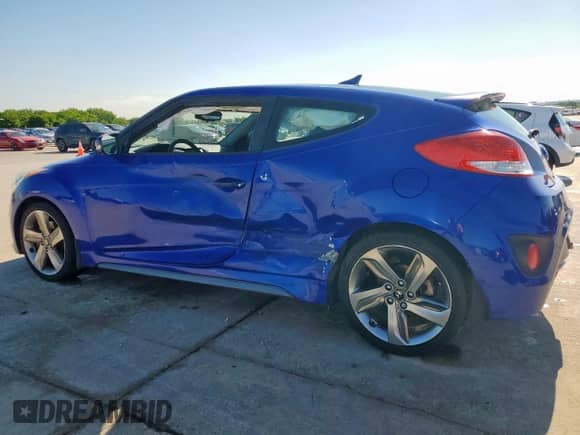 2013 Hyundai Veloster Turbo с VIN KMHTC6AE1DU164742, выставлен на аукционе Copart как лот 56278785 с пробегом 106 522 миль миль и Списание • Salvage title. История ставок и продаж доступна на DreamBid. Изображение 2.