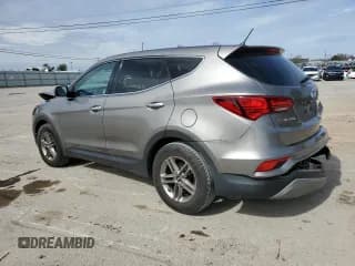 ✅ 2018 Hyundai Santa Fe 2.4L • VIN: 5NMZT3LB5JH088722 • Лот: 45246953. Опубликован ранее на Copart с пробегом 55 389 миль. Бесплатный доступ к архиву аукционных продаж из США и подробный отчёт об истории автомобиля на DreamBid. Изображение 2.